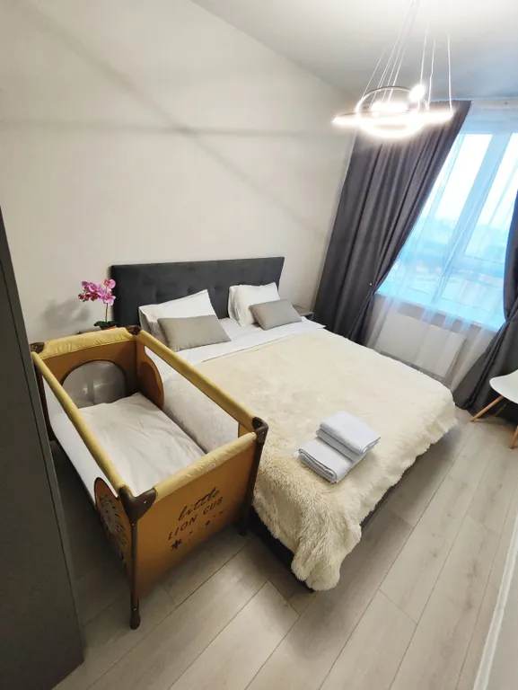 Квартира однокомнатная у Горьковской, в Кузнечихе, 40 м², Нижний Новгород — спальня, фото 2