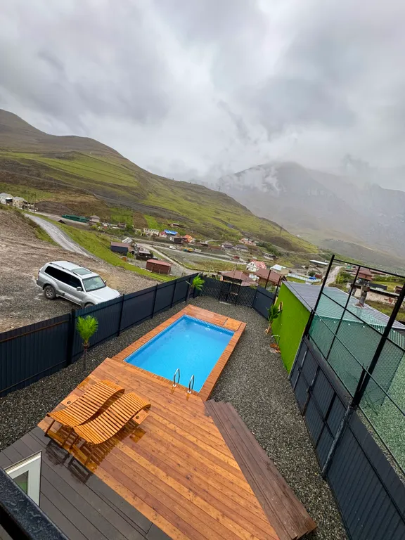 Барнхаус горах Осетии с бассейном и баней