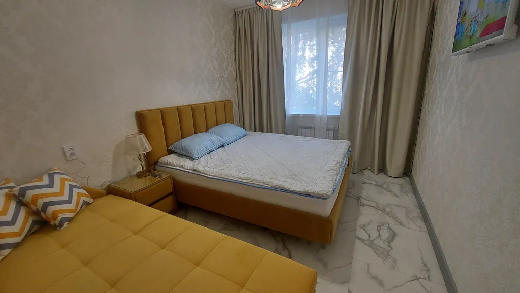 Квартира трёхкомнатная на проспекте Машиностроителее, 70 м², Ярославль — спальня, фото 5
