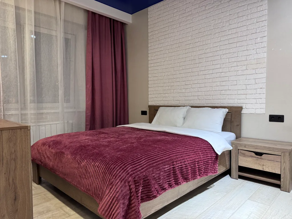 Квартира однокомнатная в Октябрьском, 45 м², Иркутск — спальня, фото 2