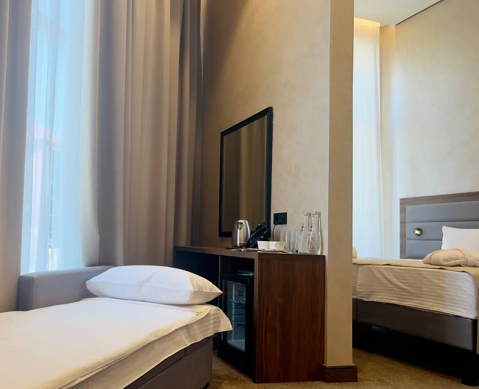 Двухместный номер с 2 отдельными кроватями стандарт — Derbent Plaza, фото 1 из 3