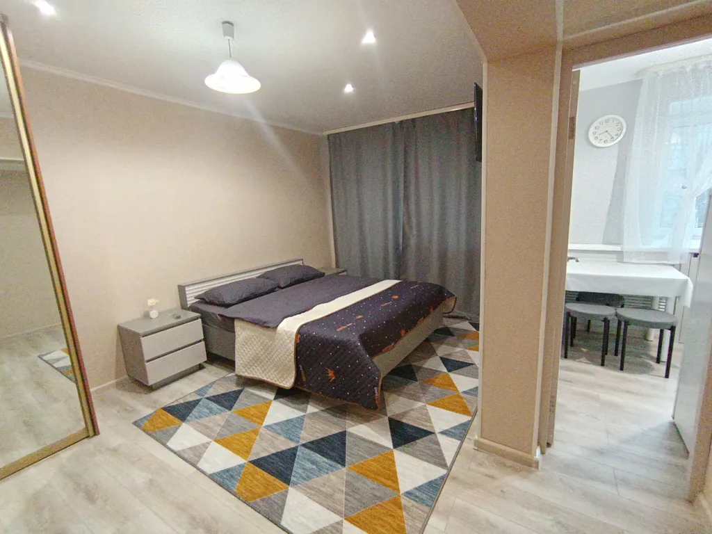 Квартира однокомнатная на улице Рижской, 30 м², Тюмень — спальня, фото 5
