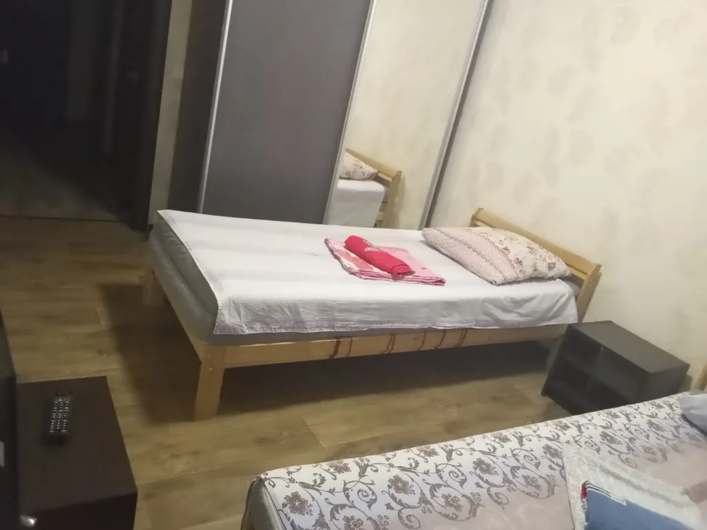 Апартаменты двухкомнатные в переулке Первостроителее, 80 м², Кстово — спальня, фото 3