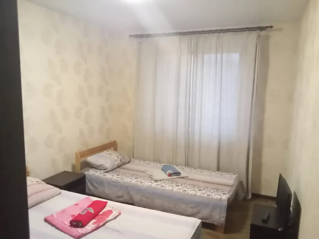 Апартаменты двухкомнатные в переулке Первостроителее, 80 м², Кстово — спальня, фото 4