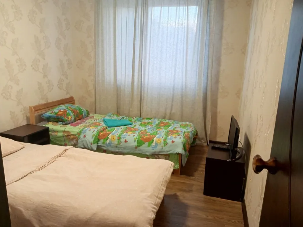 Апартаменты двухкомнатные в переулке Первостроителее, 80 м², Кстово — спальня, фото 10