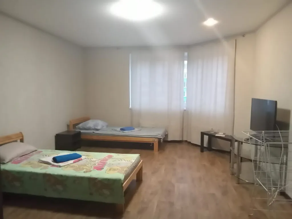 Апартаменты двухкомнатные в переулке Первостроителее, 80 м², Кстово — спальня