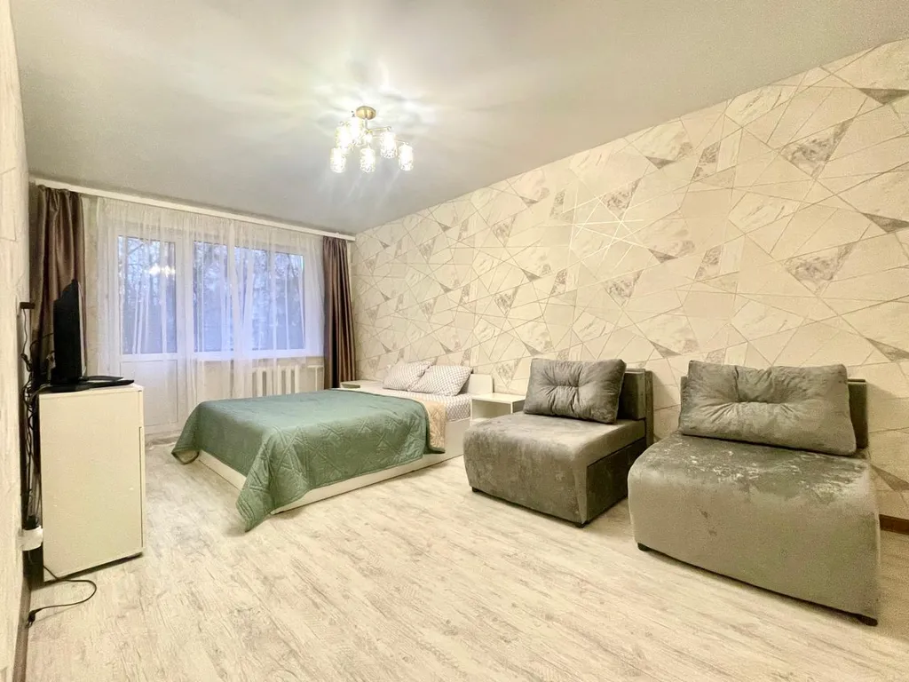 Квартира однокомнатная на улице Великанова, 32 м², Рязань — спальня, фото 2