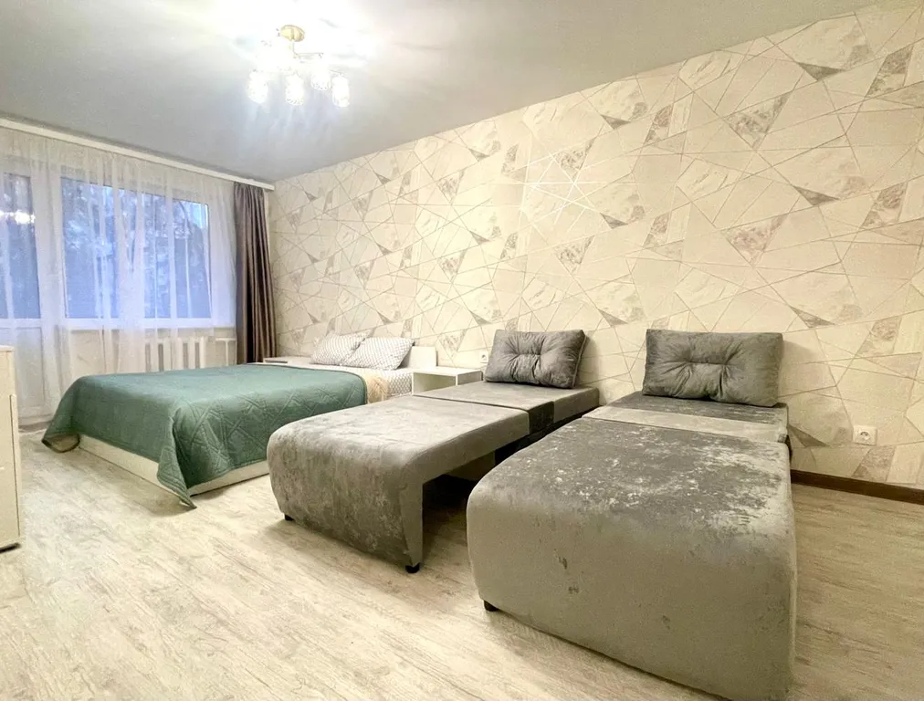Квартира однокомнатная на улице Великанова, 32 м², Рязань — спальня, фото 4