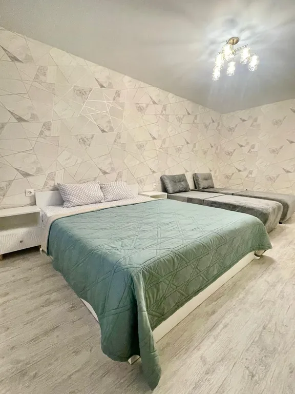Квартира однокомнатная на улице Великанова, 32 м², Рязань — спальня, фото 5