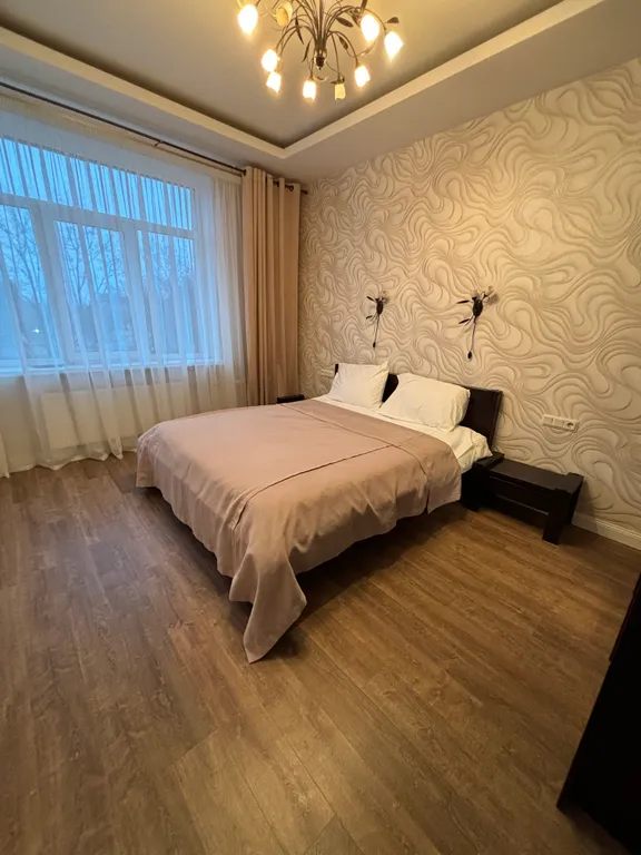 Квартира однокомнатная на улице Вокзальной, 90 м², Выборг — спальня, фото 4