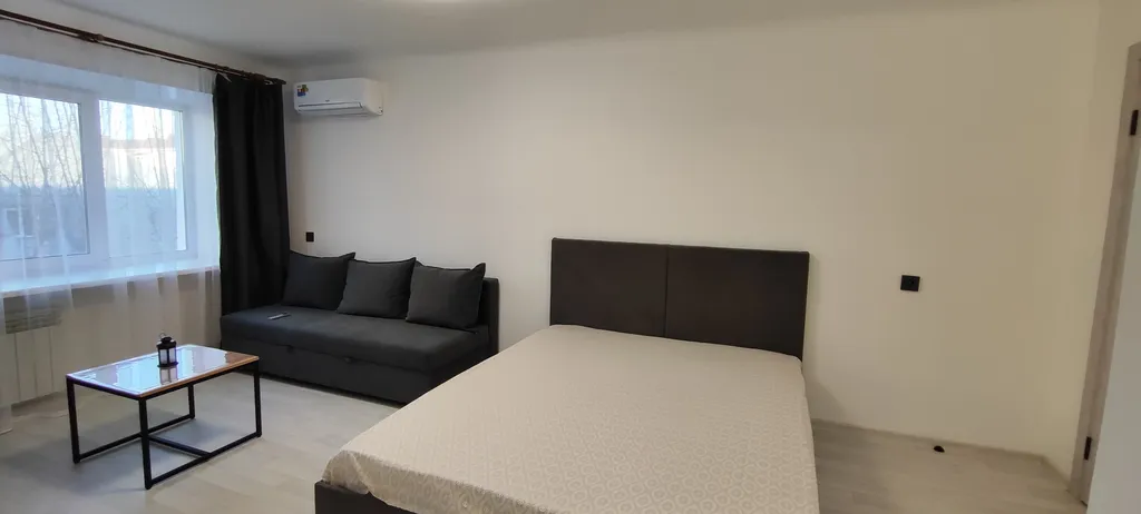 Квартира однокомнатная на улице Республики, 31 м², Тюмень — спальня, фото 4