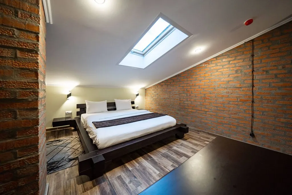 Двухместный номер с 1 кроватью мансардный кофморт — детали