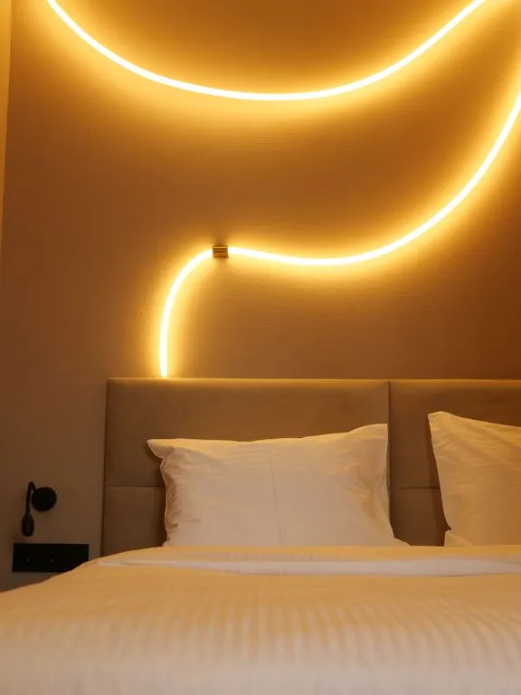 Семейный номер люкс с двуспальной кроватью и двуспальным диваном