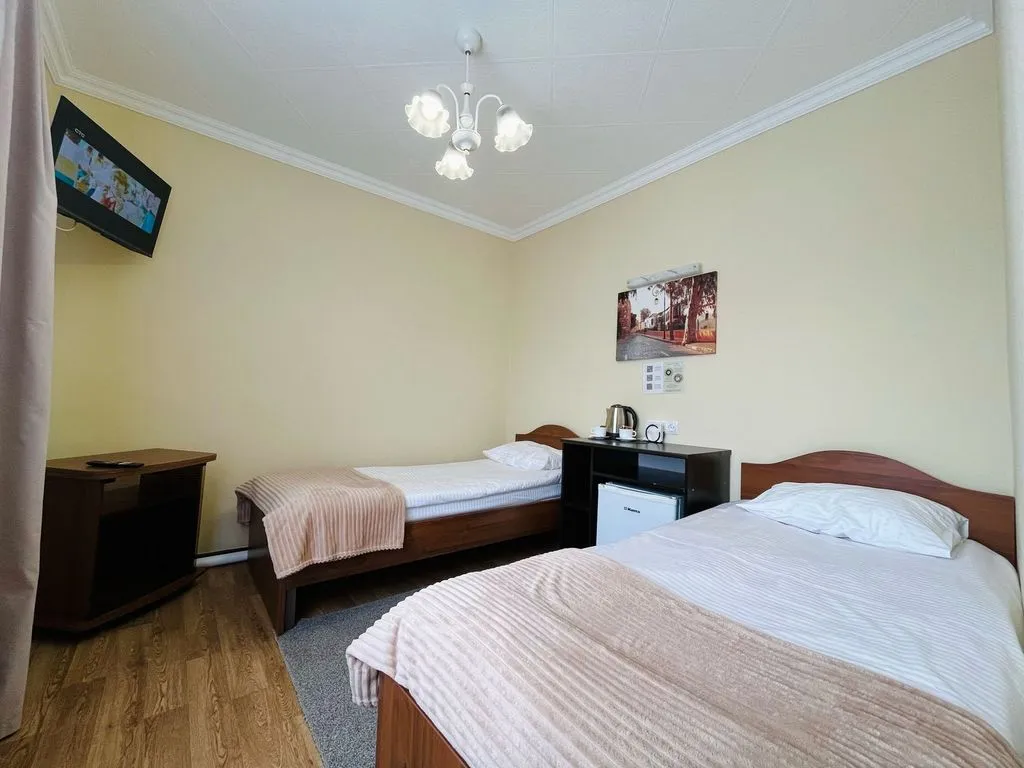 Двухместный номер с 2 отдельными кроватями Двухместный стандартный номер с раздельными односпальными кроватями