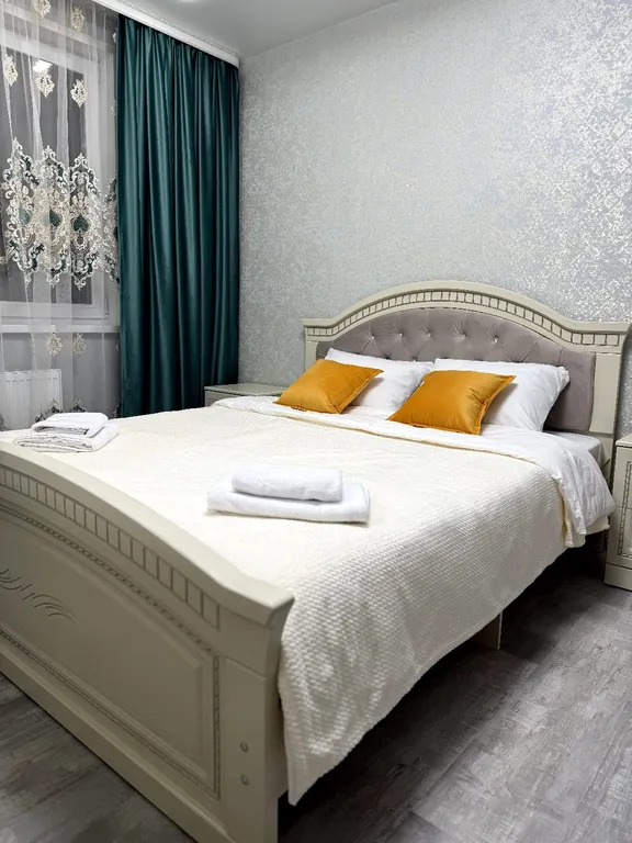 Квартира двухкомнатная на улице Брестской, 64 м², Рязань — спальня, фото 3