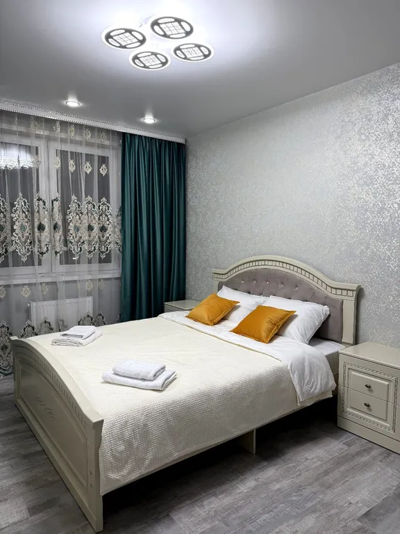 Квартира двухкомнатная на улице Брестской, 64 м², Рязань — спальня, фото 5