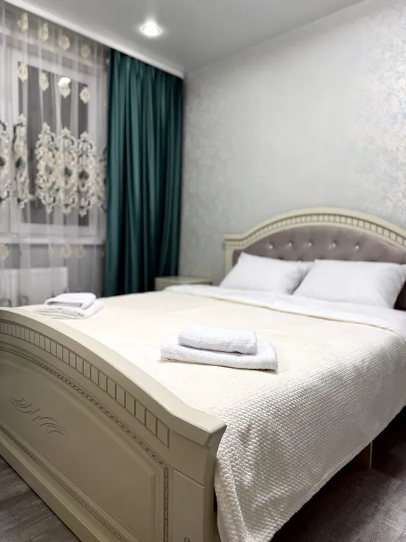 Квартира двухкомнатная на улице Брестской, 64 м², Рязань — спальня, фото 6