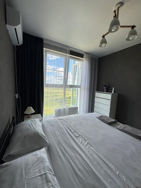 Квартира однокомнатная на улице Быстрецкой, 40 м², Рязань — спальня, фото 2