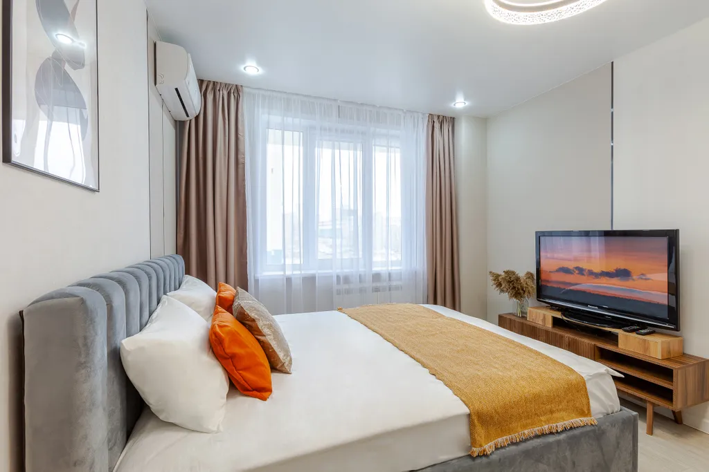 Апартаменты однокомнатные у Российской, в Октябрьском, 45 м², Самара — спальня, фото 5