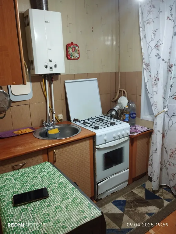 Квартира двухкомнатная на улице Тимура Фрунзе, 46 м², Старая Русса — кухня, фото 2