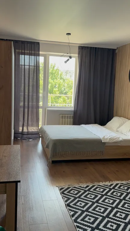 Студия однокомнатная в Дзержинском, 27 м², Волгоград — спальня, фото 4