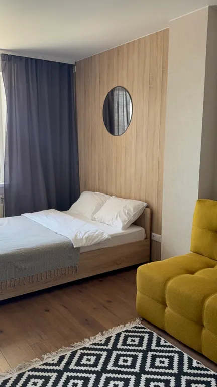 Студия однокомнатная в Дзержинском, 27 м², Волгоград — спальня, фото 3
