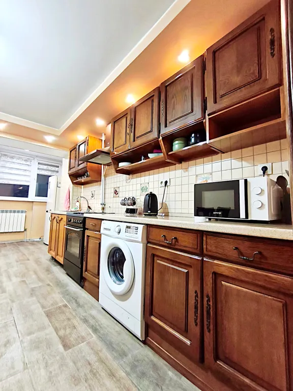 Квартира трёхкомнатная на улице Коцоева, 82 м², Владикавказ — кухня, фото 3