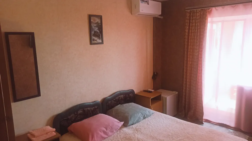 8. Двухместный номер с 2 отдельными кроватями стандарт с балконом