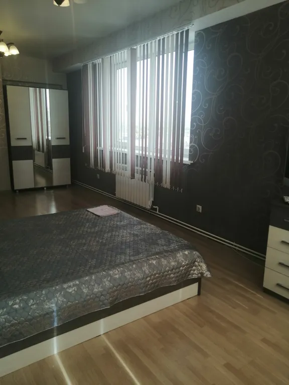 Квартира однокомнатная в Кировском, 50 м², Иркутск — спальня, фото 2