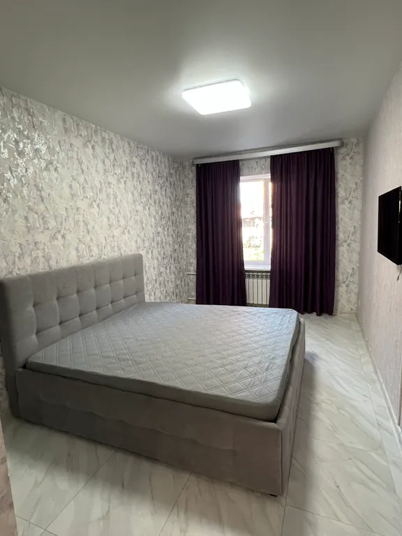 Квартира двухкомнатная на проспекте Карла Маркса, 58 м², Каменск-Шахтинский — спальня, фото 4