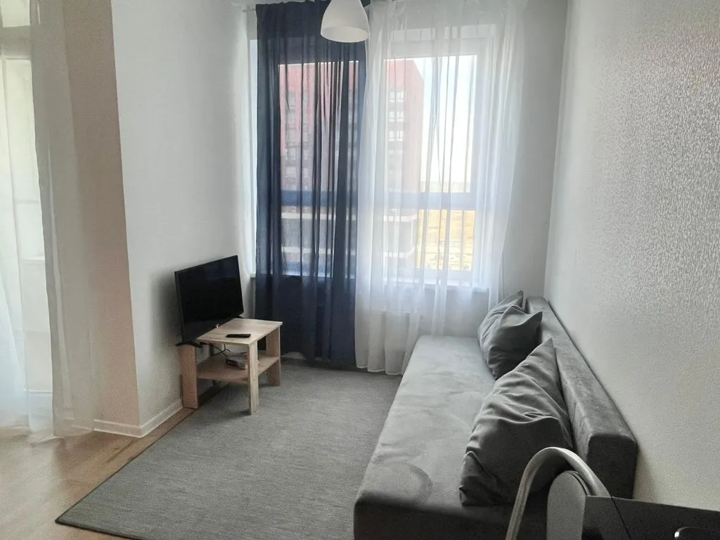 Студия однокомнатная в Чкаловском, 34 м², Екатеринбург — спальня, фото 5