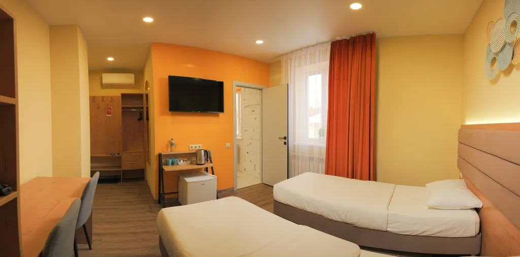 Двухместный номер с 2 отдельными кроватями теплый для двух путешественников