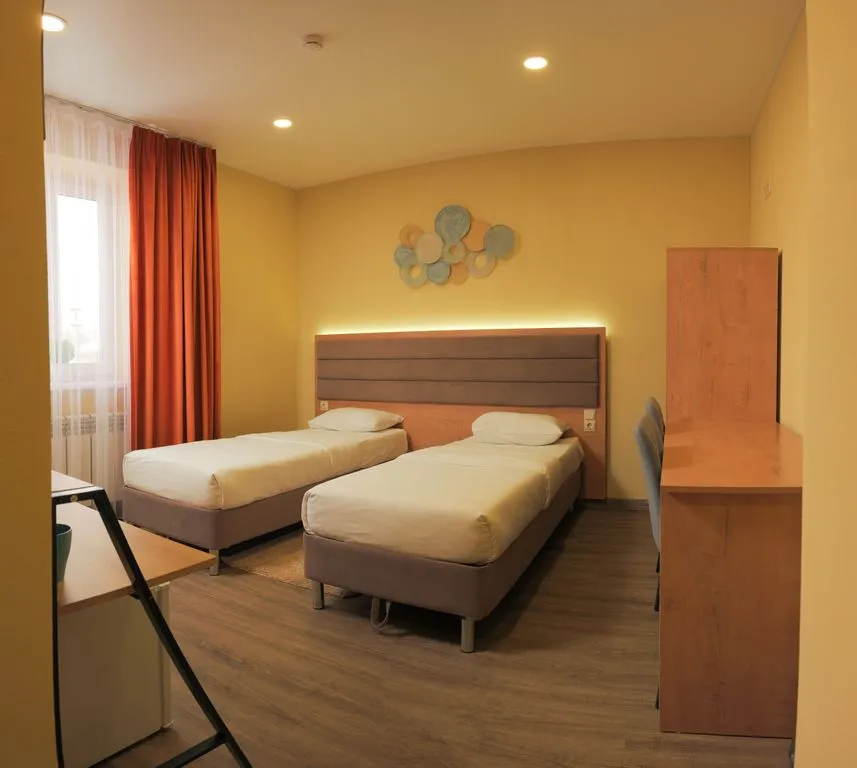 Двухместный номер с 2 отдельными кроватями теплый для двух путешественников