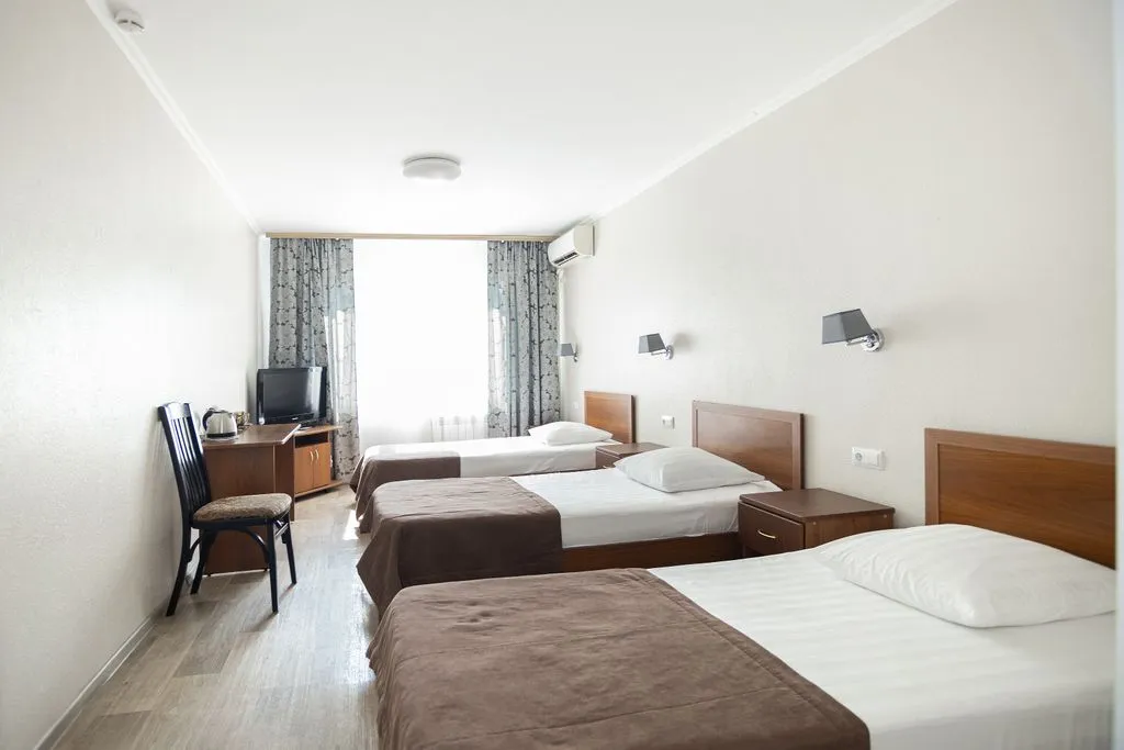 Трёхместный номер семейный номер с тремя кроватями