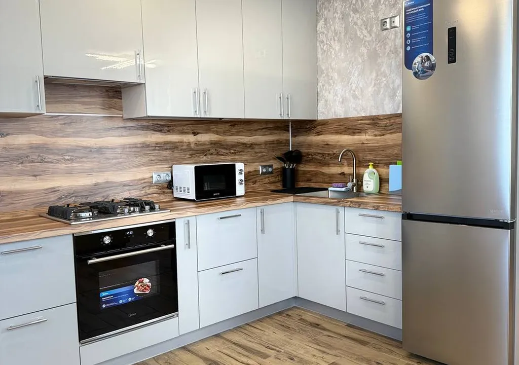 Квартира двухкомнатная на улице Новосёлове, 60 м², Рязань — кухня
