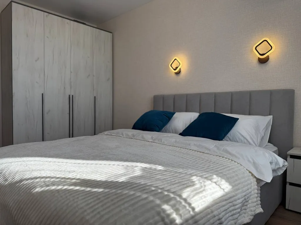 Квартира двухкомнатная на улице Новосёлове, 60 м², Рязань — спальня, фото 5