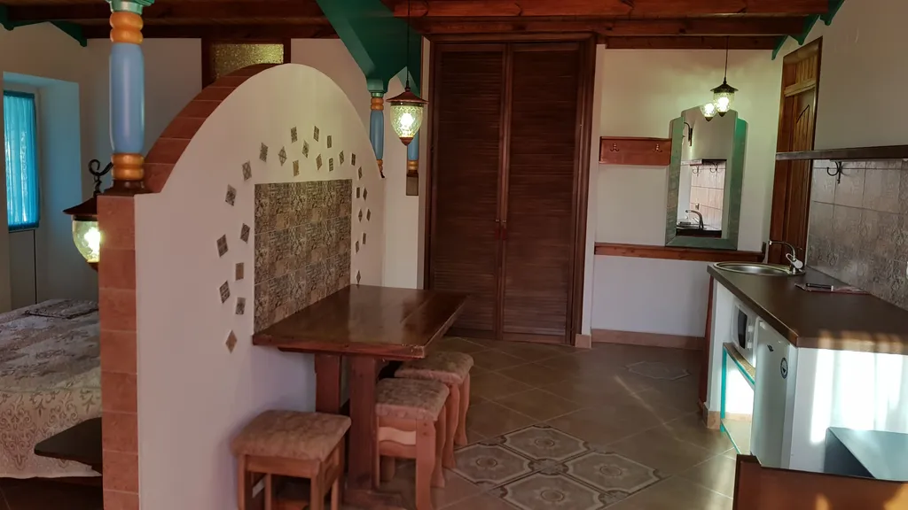 Апартаменты Однокомнатный апартамент с мини кухней в восточном стиле