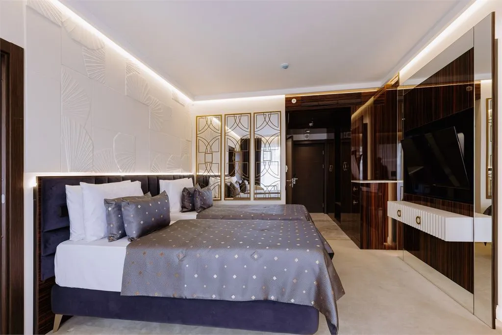 Двухместный номер с 2 отдельными кроватями стандарт низкий этаж — Marine Garden Sochi Hotels & Spa, фото 1 из 5