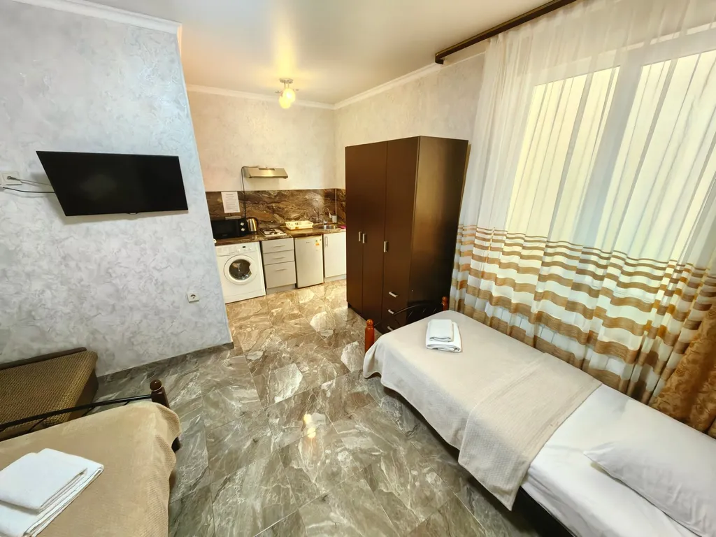 Четырёхместный номер студия — Олимпийский, фото 4 из 5