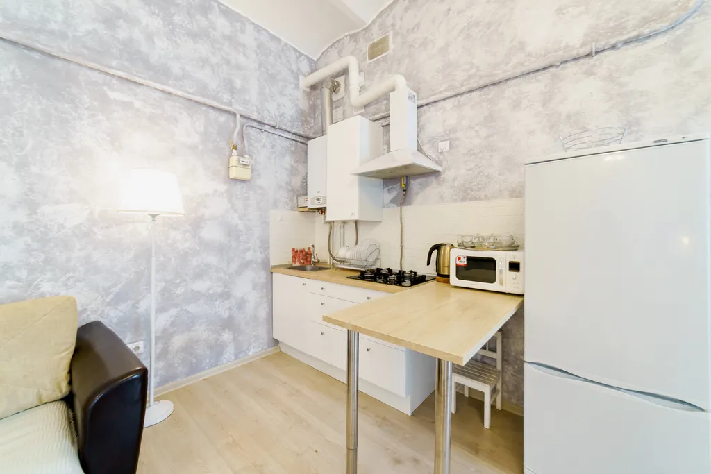 Квартира однокомнатная в Нижегородском, 59 м², Нижний Новгород — кухня, фото 3