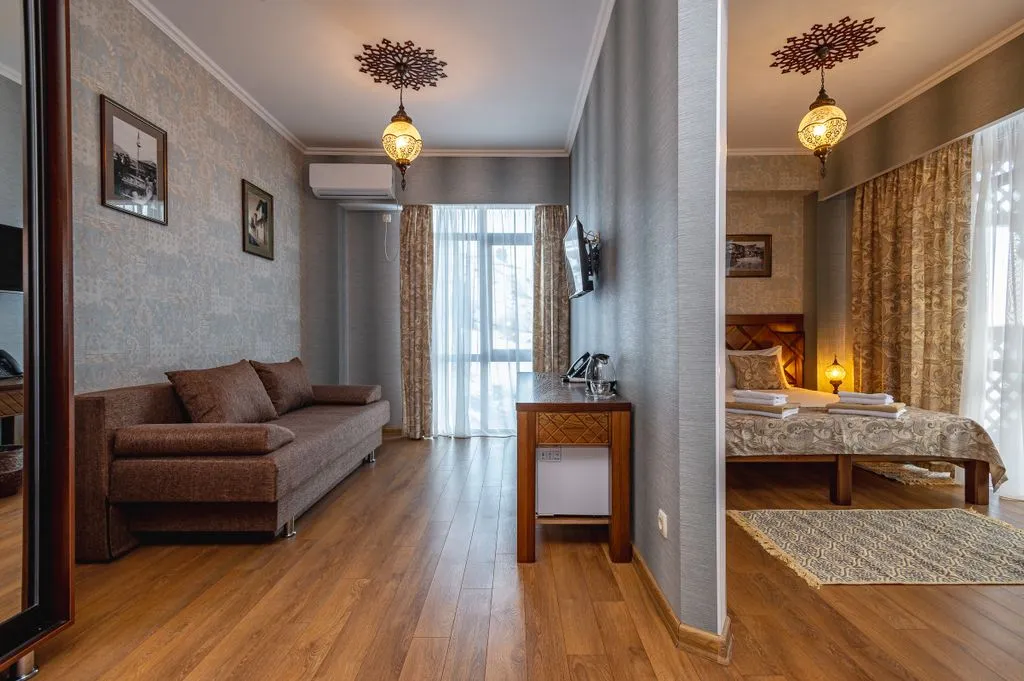 Семейный номер делюкс с боковым видом на море и окрестности (Family Deluxe Side Sea and Land View) — спальное место