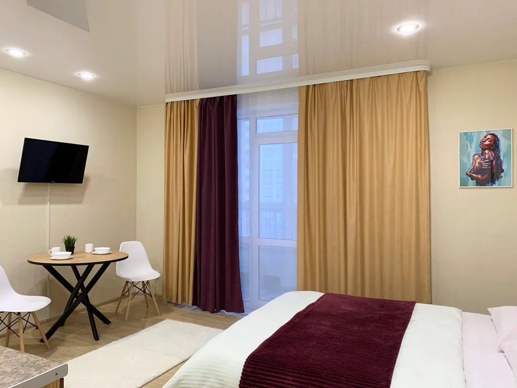 Апартаменты однокомнатные на улице Обдорской, 30 м², Тюмень — спальня, фото 2