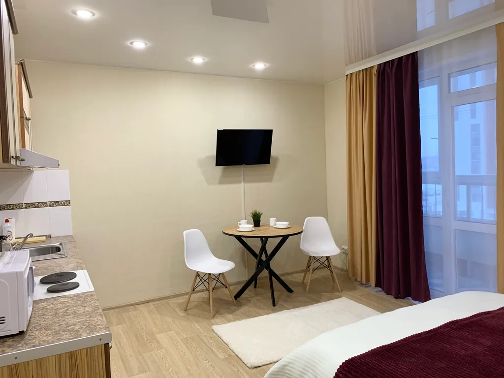 Апартаменты однокомнатные на улице Обдорской, 30 м², Тюмень — спальня, фото 3