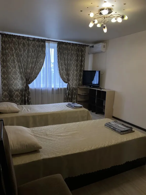 Квартира двухкомнатная на проспекте Победы, 57 м², Кисловодск — спальня, фото 4